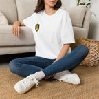Shield Crest T-Shirt — Minimalist Green & Gold Logo Tee